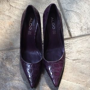 Also purple patent snake skin heels